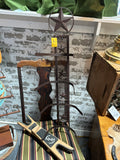 Wrought-iron cowboy hat holders